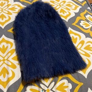 Fuzzy, super soft, dark blue beanie.
